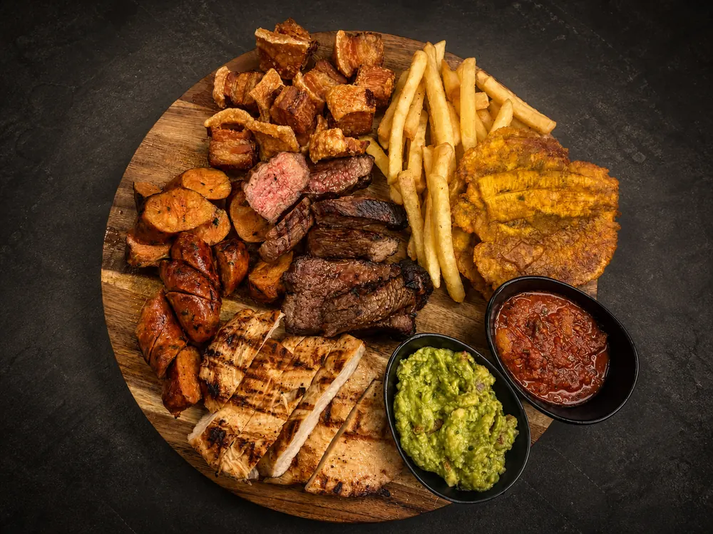 Picada Los Primos: steak, chicharrón, chorizo, tostones and fries